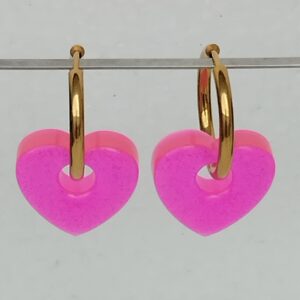 Pampilles cœurs rose fluo phosphorescents en résine époxy